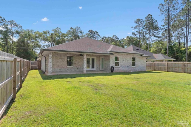 591 Nowak Rd, Cantonment, FL 32533 - back of house with brick siding, ceiling fan, roof with shingles, and french doors