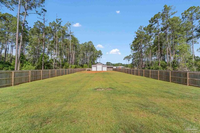 591 Nowak Rd, Cantonment, FL 32533 - view of yard with a detached garage
