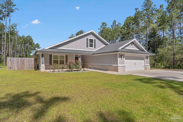 591 Nowak Rd, Cantonment, FL 32533 - craftsman inspired home featuring brick siding, an attached garage, concrete driveway, a shingled roof, and board and batten siding