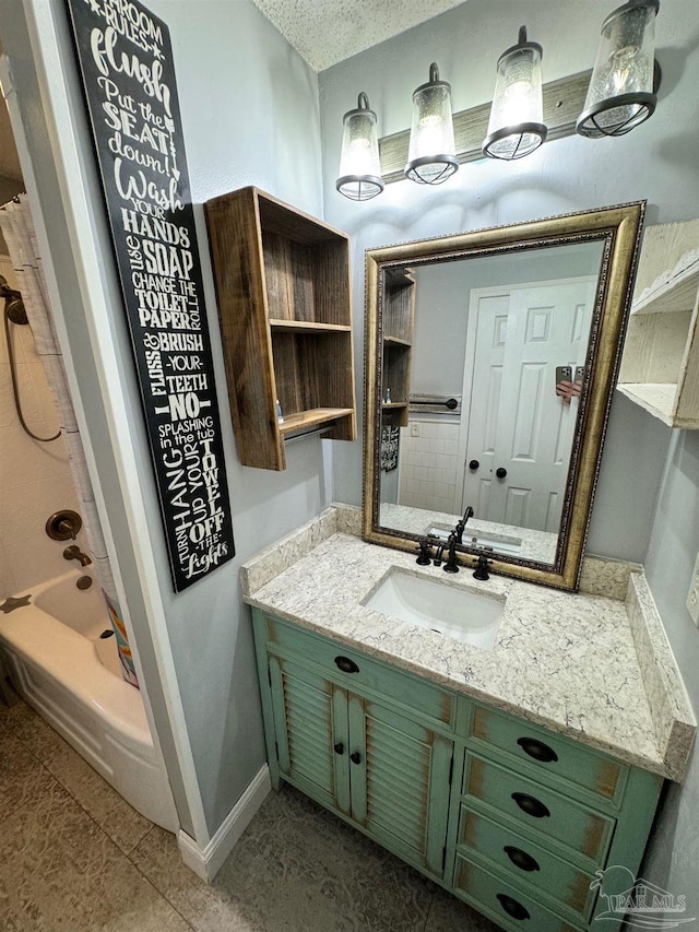 full bath featuring shower / bath combo, a textured ceiling, vanity, baseboards, and tile patterned floors