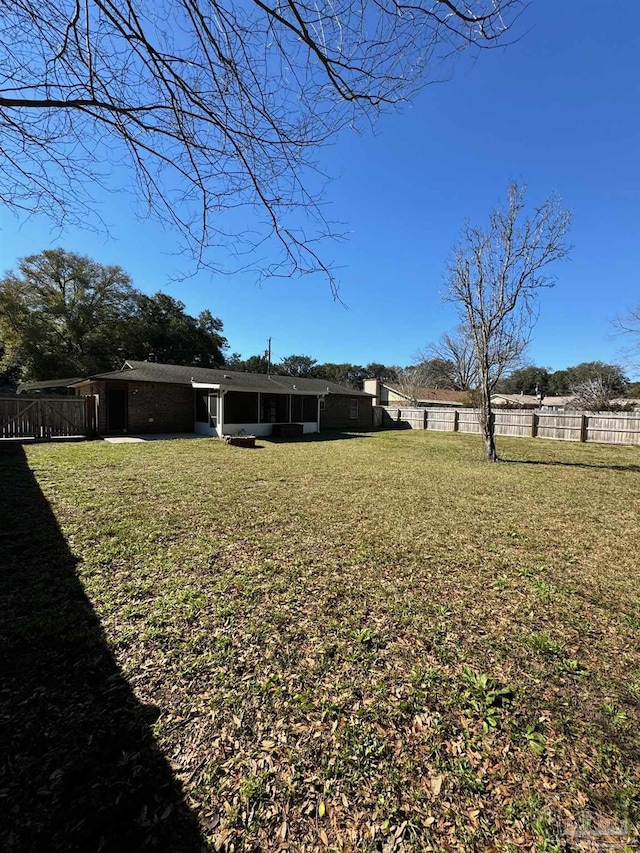 view of yard with fence