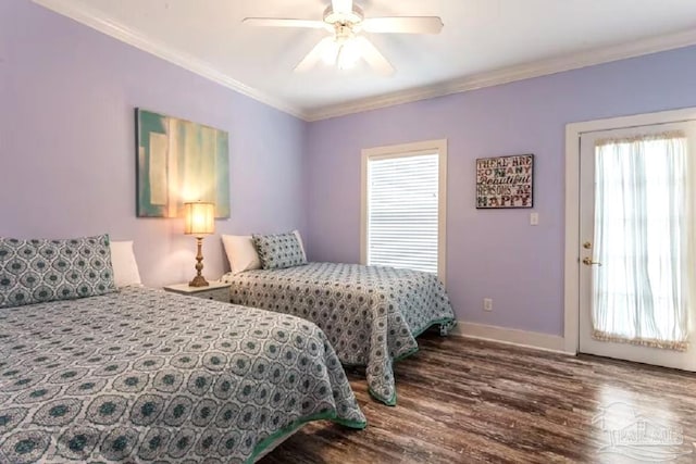 bedroom with ornamental molding, wood finished floors, a ceiling fan, and baseboards