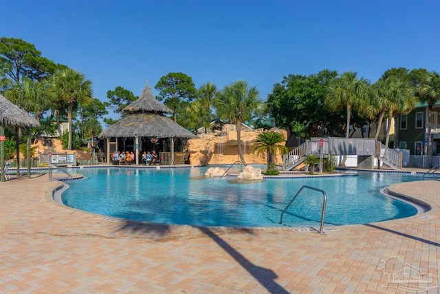 view of swimming pool featuring a gazebo and a patio area