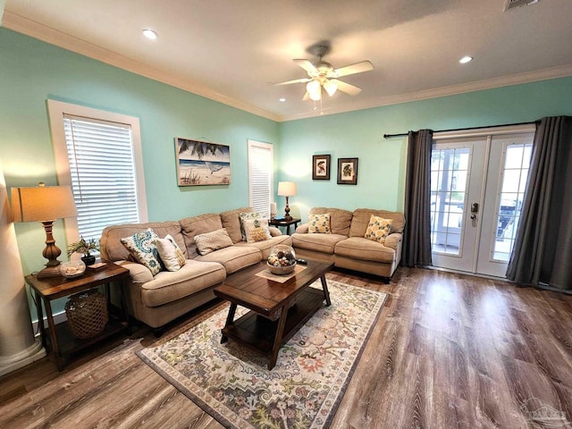 living room with ceiling fan, french doors, wood finished floors, and crown molding