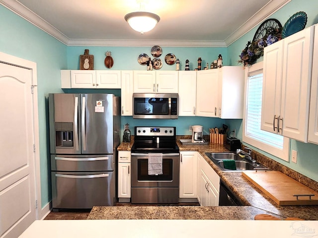 kitchen featuring sink, crown molding, stainless steel appliances, and white cabinets