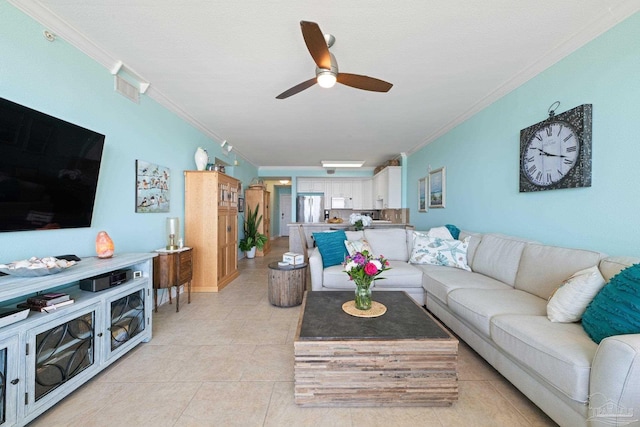 4050 Indigo Dr Unit 102, Pensacola, FL 32507 - living area with ornamental molding, ceiling fan, and light tile patterned floors
