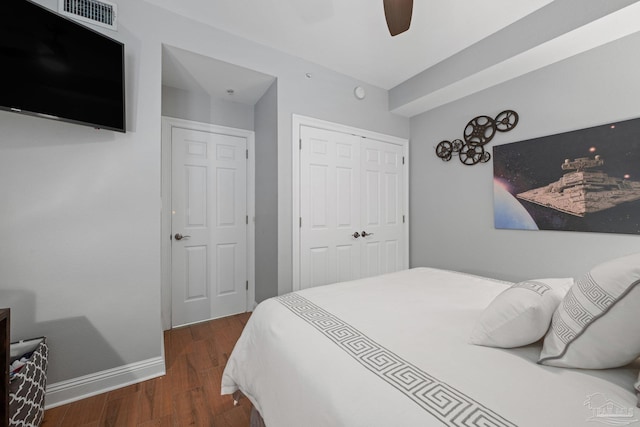 4050 Indigo Dr Unit 102, Pensacola, FL 32507 - bedroom with wood finished floors, a closet, baseboards, and a ceiling fan