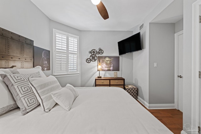 4050 Indigo Dr Unit 102, Pensacola, FL 32507 - bedroom with wood finished floors, baseboards, and a ceiling fan