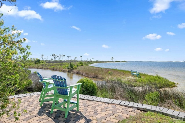 4050 Indigo Dr Unit 102, Pensacola, FL 32507 - view of patio / terrace featuring a water view