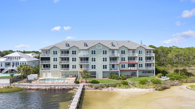 4050 Indigo Dr Unit 102, Pensacola, FL 32507 - view of building exterior with a water view