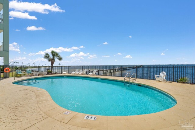 4050 Indigo Dr Unit 102, Pensacola, FL 32507 - community pool featuring fence, a patio area, and a water view