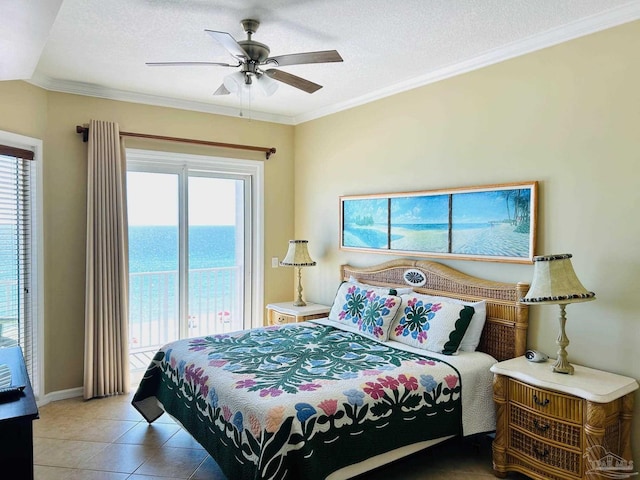 tiled bedroom featuring ornamental molding, multiple windows, and a textured ceiling