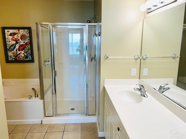 full bath featuring tile patterned flooring, vanity, a bath, and a shower stall