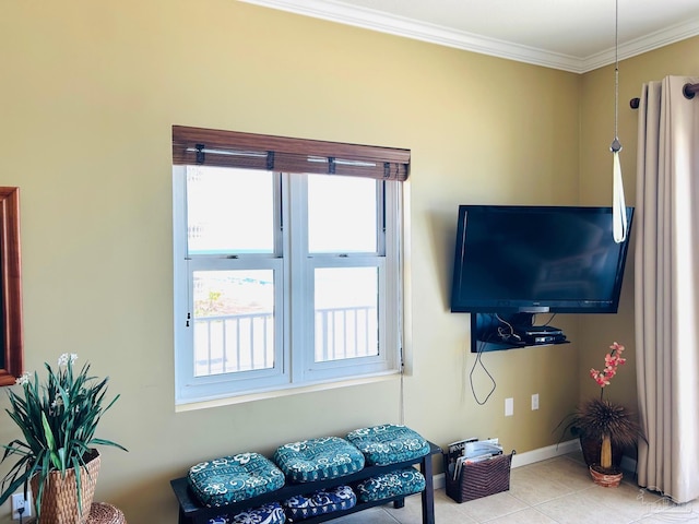 living room with baseboards, tile patterned floors, and crown molding