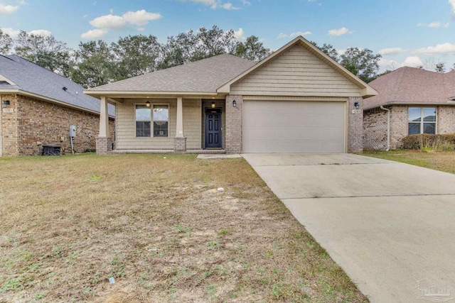 view of front of property featuring a front yard, a porch, a garage, and central air condition unit