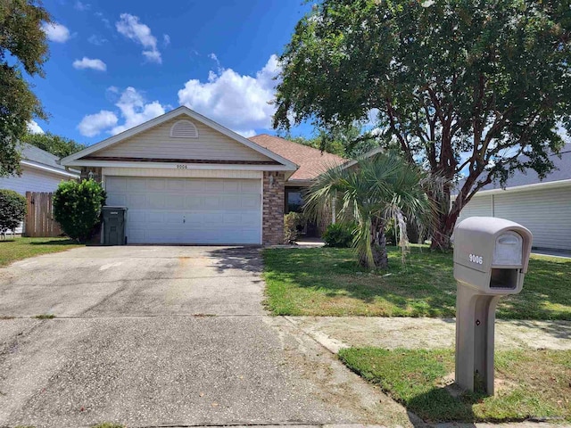 ranch-style home with a garage and a front yard