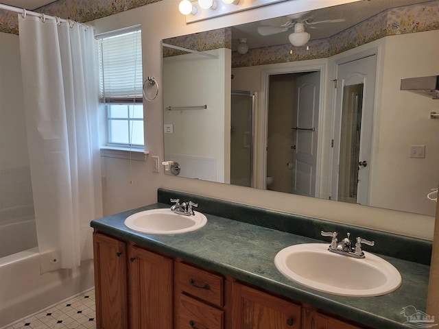 full bathroom featuring vanity, shower / bath combination with curtain, and toilet