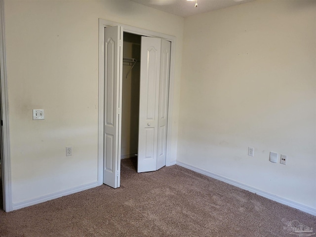 unfurnished bedroom with carpet