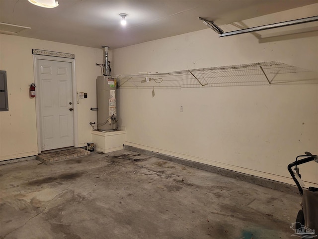 garage with electric panel and gas water heater