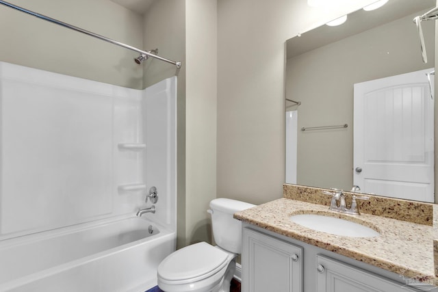 full bathroom featuring shower / bathing tub combination, toilet, and vanity