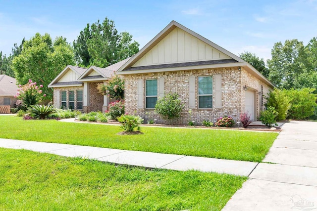 craftsman-style home with a garage and a front lawn