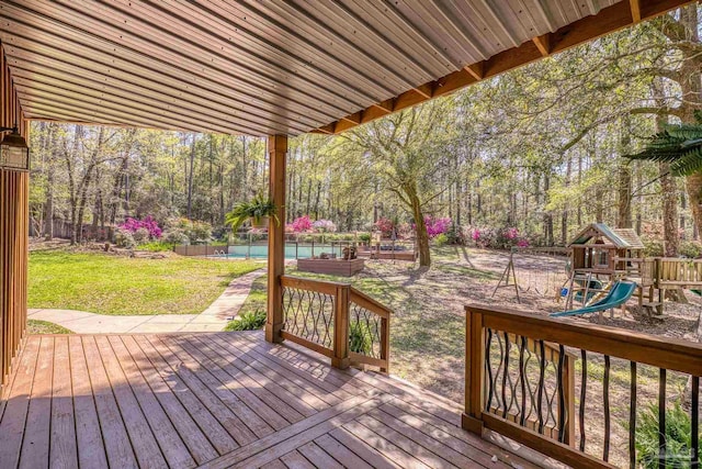 1221 Tecumseh Pl, Pensacola, FL 32514 - deck featuring a swimming pool and a playground