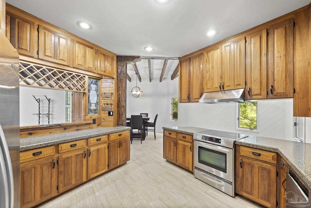 1221 Tecumseh Pl, Pensacola, FL 32514 - kitchen with appliances with stainless steel finishes, under cabinet range hood, brown cabinetry, tasteful backsplash, and recessed lighting