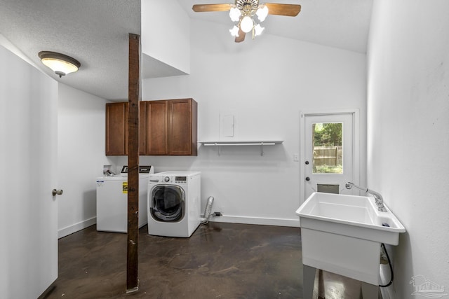 1221 Tecumseh Pl, Pensacola, FL 32514 - laundry area featuring washer and dryer, cabinet space, a ceiling fan, and a high ceiling