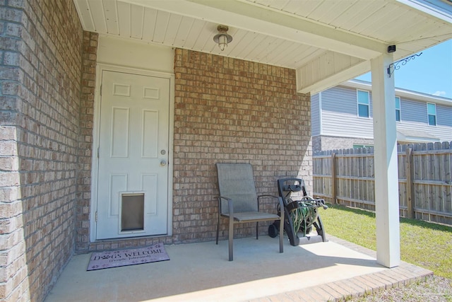 doorway to property with a patio