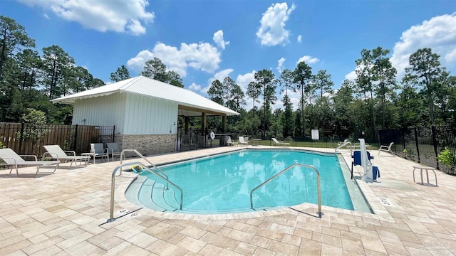 view of pool with a patio