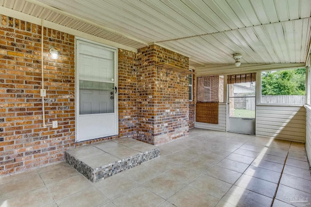 exterior space with wood ceiling