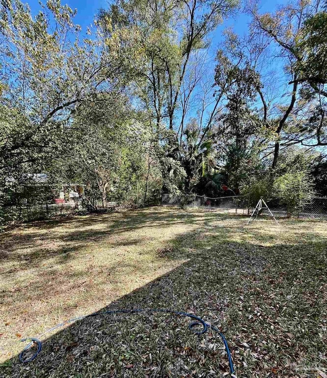 view of yard with fence