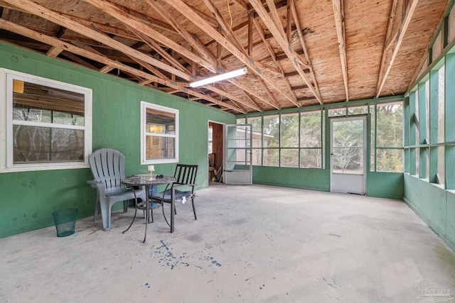 sunroom / solarium featuring a healthy amount of sunlight