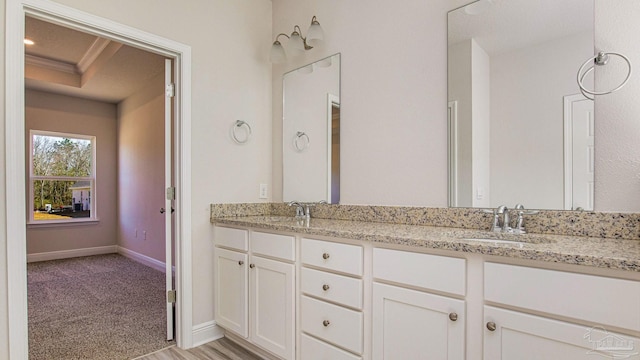 8616 Bluebell St, Milton, FL 32583 - bathroom with double vanity and baseboards