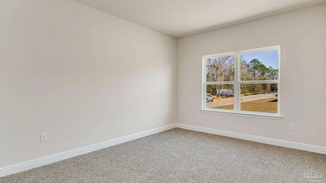 8616 Bluebell St, Milton, FL 32583 - carpeted empty room with baseboards