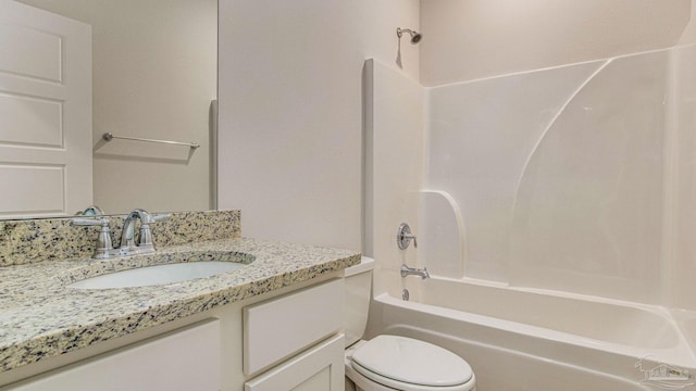 8616 Bluebell St, Milton, FL 32583 - bathroom featuring toilet, vanity, and shower / washtub combination