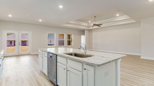 8616 Bluebell St, Milton, FL 32583 - kitchen featuring a sink, stainless steel dishwasher, open floor plan, baseboards, and recessed lighting