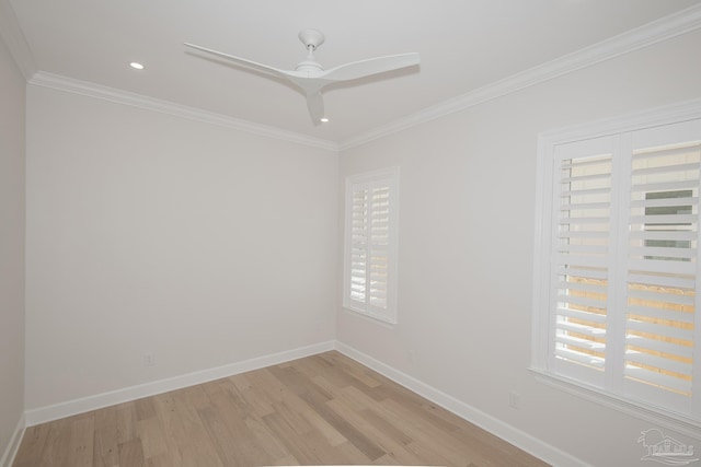 unfurnished room with ceiling fan, light wood-type flooring, baseboards, and ornamental molding