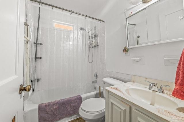 full bathroom featuring vanity, shower / bathtub combination with curtain, and toilet