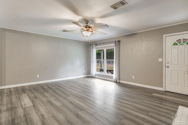 6845 Trail Ride S, Milton, FL 32570 - foyer with a ceiling fan, wood finished floors, ornamental molding, and baseboards