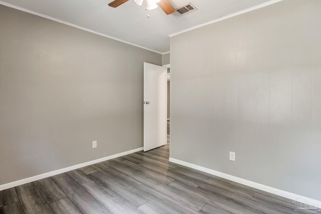 6845 Trail Ride S, Milton, FL 32570 - unfurnished room featuring a ceiling fan, wood finished floors, crown molding, and baseboards
