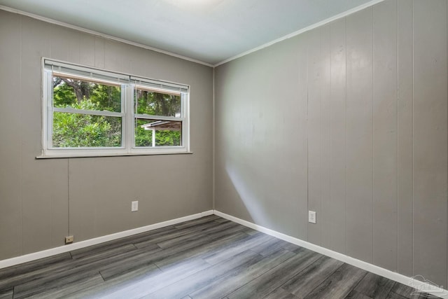 6845 Trail Ride S, Milton, FL 32570 - spare room featuring wood finished floors, healthy amount of natural light, crown molding, and baseboards