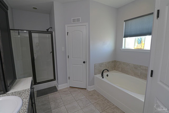 bathroom with vanity, separate shower and tub, and tile patterned flooring