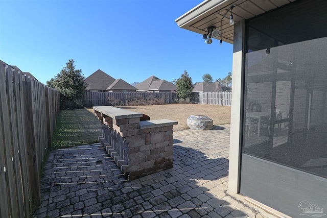 view of patio / terrace featuring a fire pit