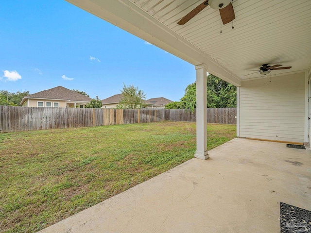 exterior space featuring ceiling fan and a patio area