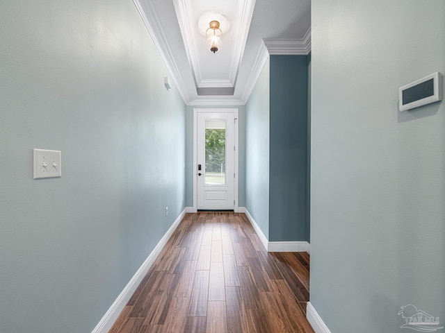 entryway with crown molding and dark hardwood / wood-style flooring