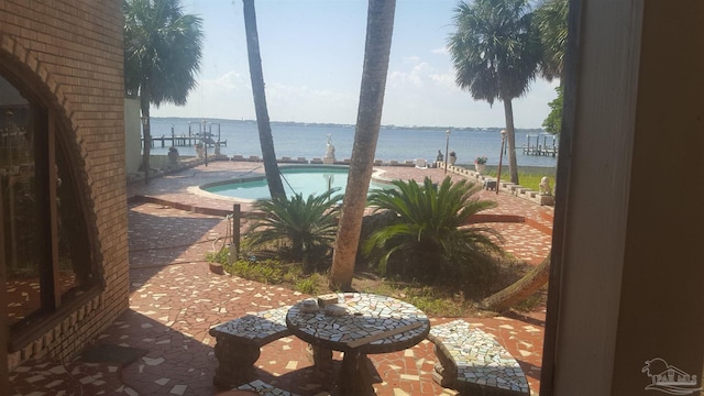 property view of water featuring a dock