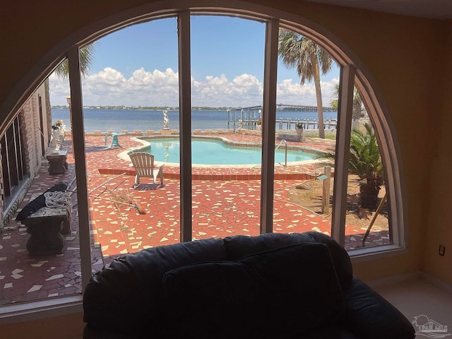 entryway featuring a water view