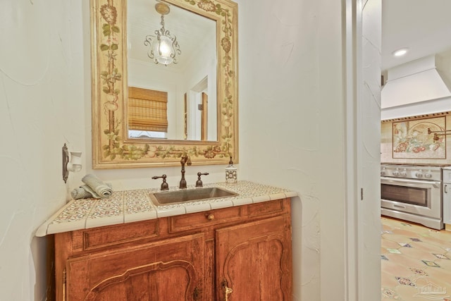 bathroom featuring vanity and crown molding