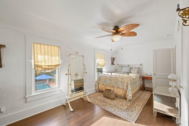 bedroom with wood-type flooring and ceiling fan